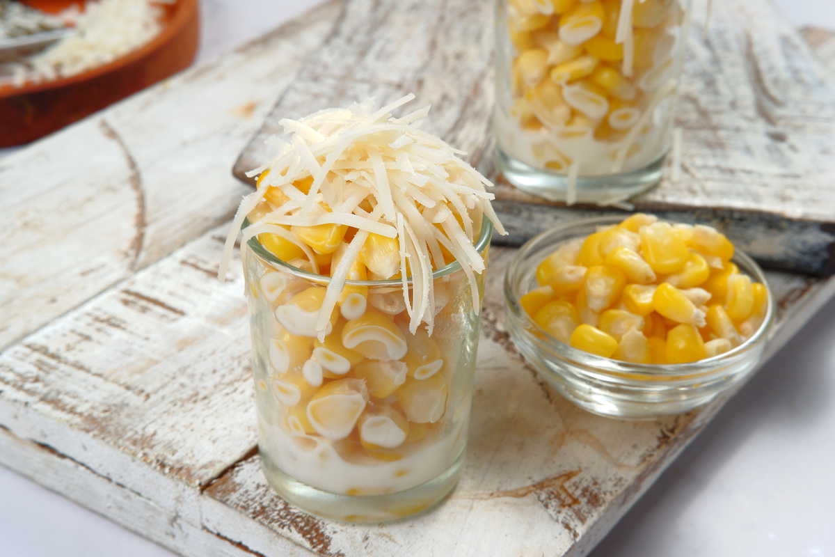 Jasuke or Jagung Susu Keju is A popular sweet and creamy snacks from West Java.steamed sweet corn mixed with milk and grated cheese